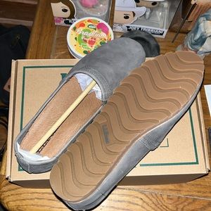 Women’s size 7.5 slip on’s.